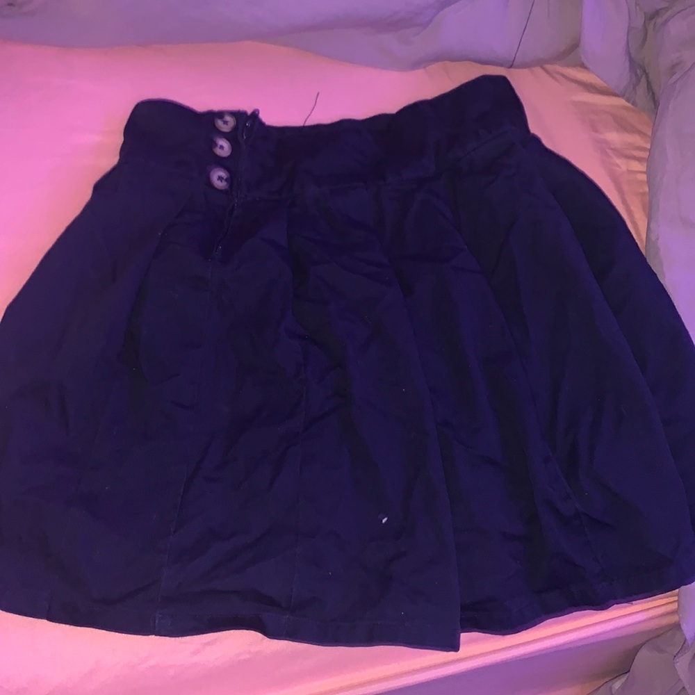 A navy blue uniform girls skirt